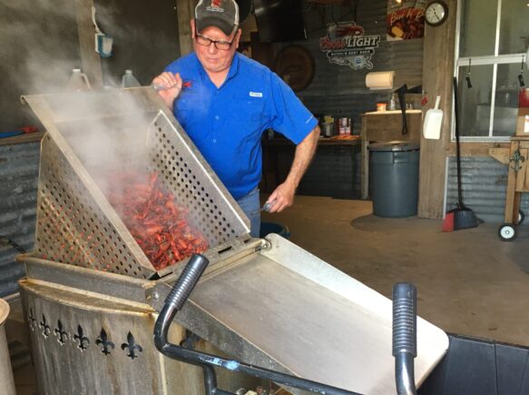 Barry Toups boiling crawfish
